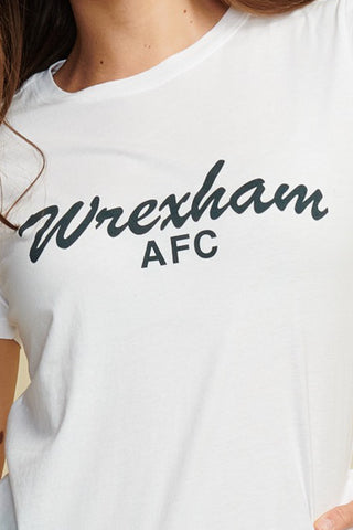 Close up, Photo of female model wearing white tee with "wrexham afc" written out in script text along. Black text, Short Sleeve
