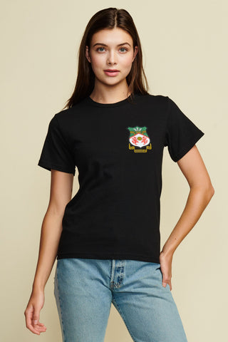 Cropped photograph of a female model wearing a black short sleeve tee with the wrexham crest written on the left front chest. Crest is red, green, yellow, and white.